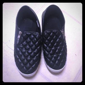 Black quilted shoes
